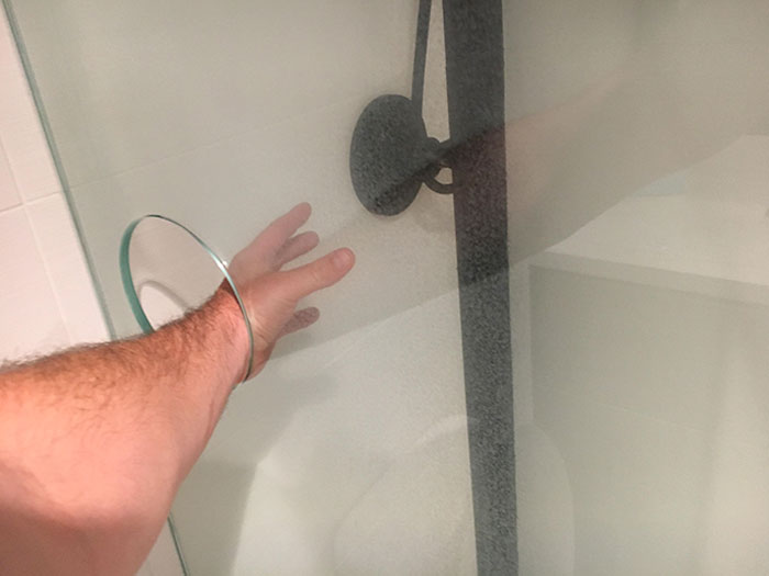 The Shower At This Hotel Has A Hole In The Stationary Glass To Turn On The Water Without Being In The Shower
