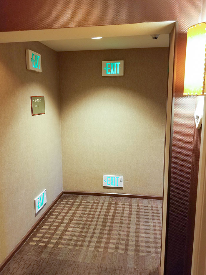 My Hotel Has Exit Signs Positioned Lower In Case Smoke Fills The Hallway And You Have To Crawl Out