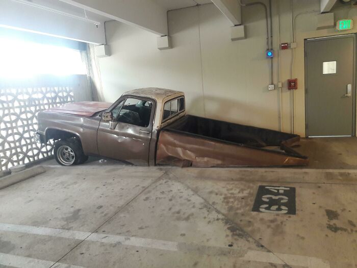This Cut In Half Truck That Looks Like It's Coming Out The Floor