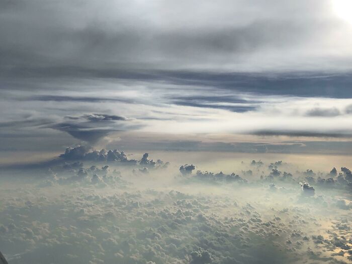Unbelievable photo taken on Earth, showing a dense cloudscape under a stormy sky, feeling like glimpses into another universe.
