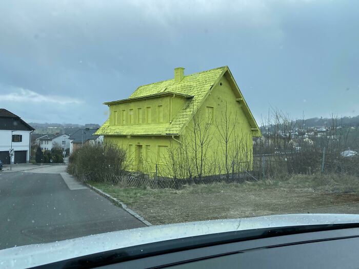A Whole House Covered In Neon Yellow Spray Paint. For Some Reason