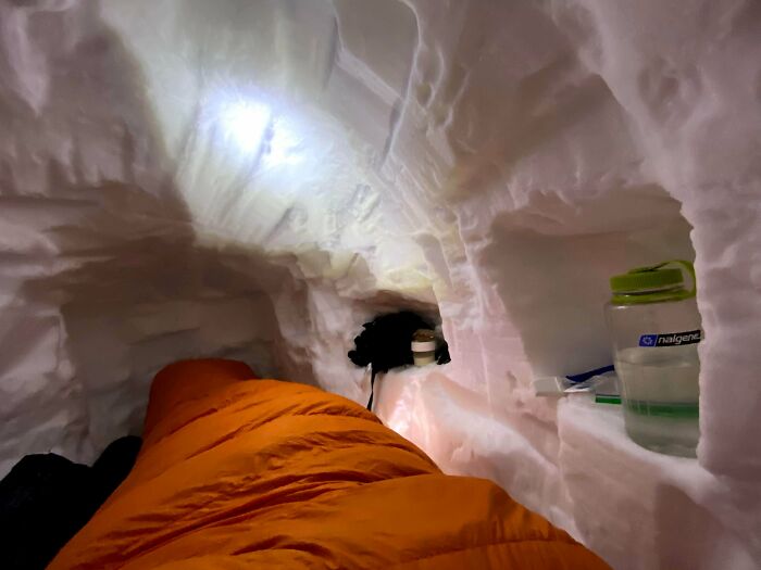 A Cozy Snow Cave On A Top Of A Mountain
