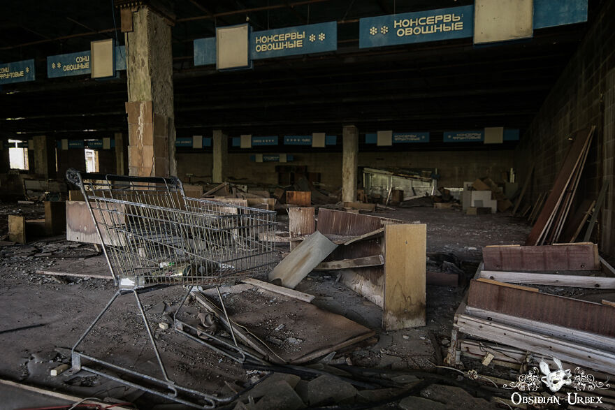 Shopping Trolley In An Abandoned Supermarket