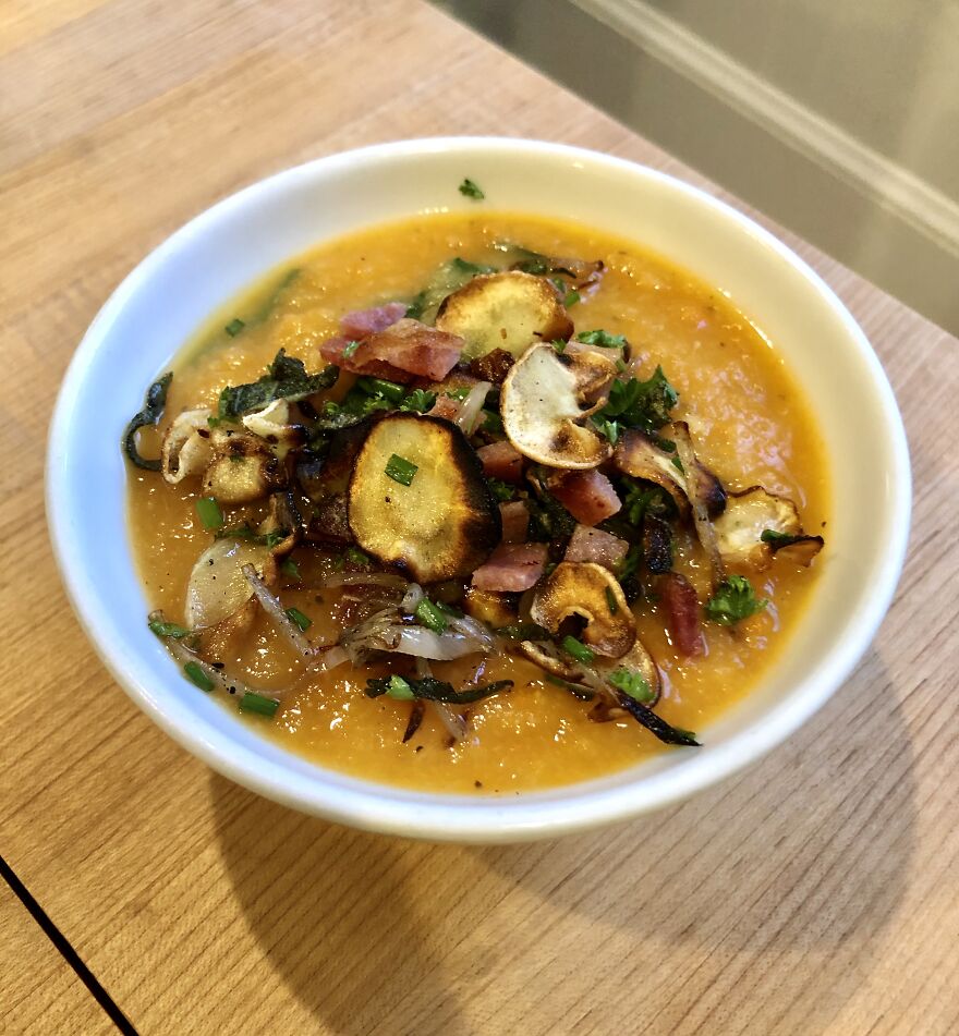 Carrot And Parsnip Soup With A Gremolata Of Bacon, Chives, Parsley And Fried Parsnip And Sage