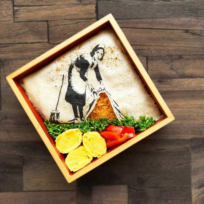 Bento artist creates detailed lunchbox with edible art inspired by TV shows, movies, and manga favorite characters.