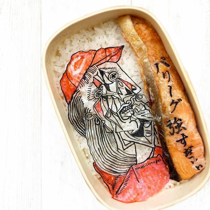 Bento artist lunchbox featuring detailed character art from favorite TV shows, movies, and manga on rice and salmon.