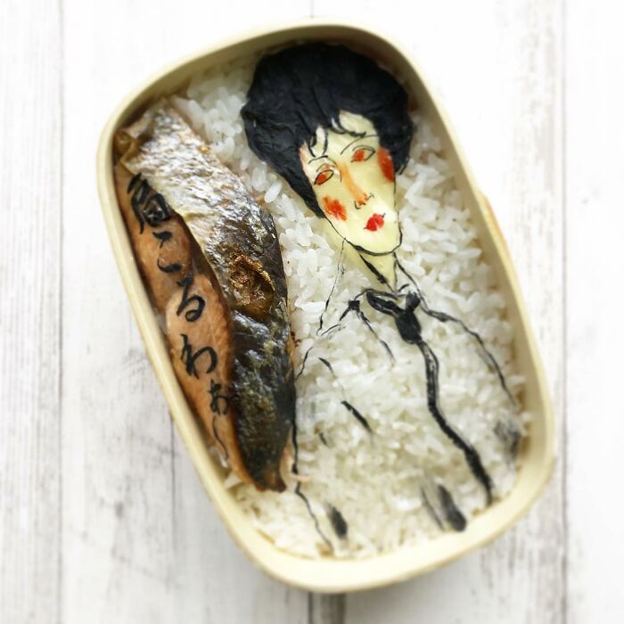 Bento artist creates detailed lunchbox art of a character from TV shows and manga using rice and seaweed.