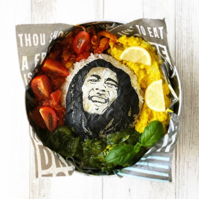 Bento artist creates lunchbox featuring detailed rice art with colorful side dishes inspired by favorite shows and movies.