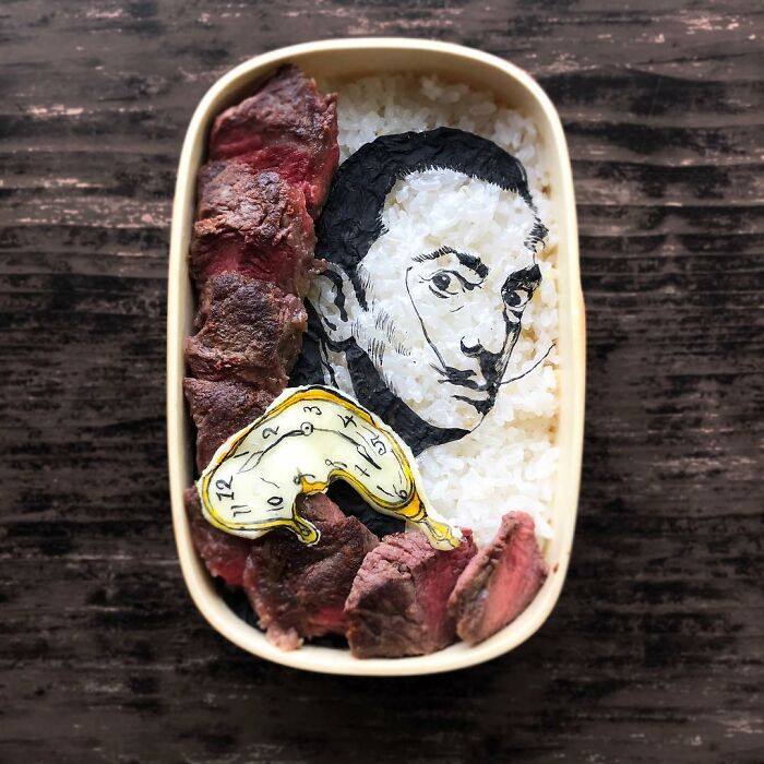 Bento artist creates lunchbox with Salvador Dalí art using rice, seaweed, and meat inspired by favorite TV shows and movies.
