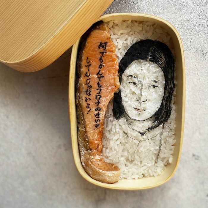 Bento artist creates detailed lunchbox featuring rice portrait and salmon inspired by favorite TV shows and manga.