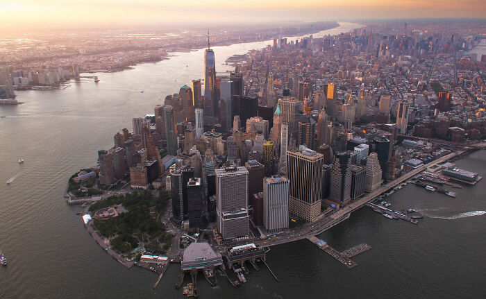 Island of Manhattan from the air view during sunset 
