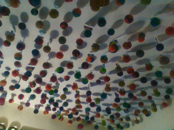 A Small Section Of My Bedroom Ceiling With 1,238 Kooshballs Hanging From It