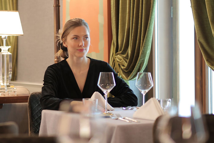 woman in a restaurant sitting alone