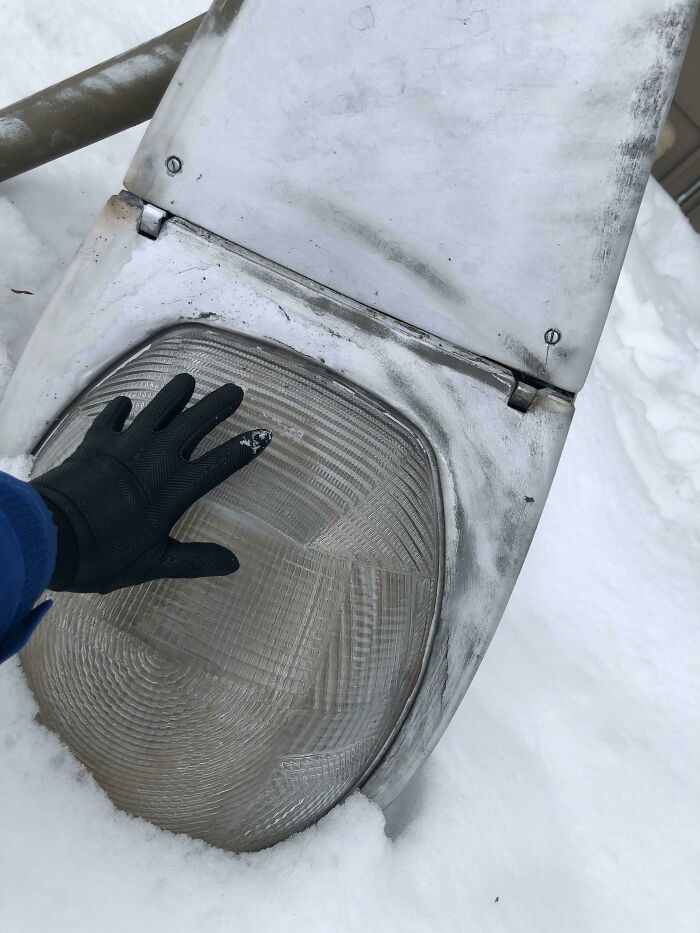 A Street Lamp Fell Over Into The Snow Outside My Apartment. Turns Out They’re Massive - My Hand For Scale