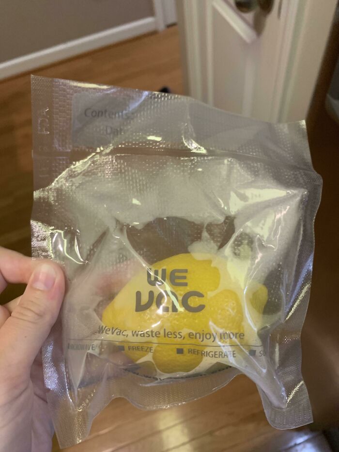 A Packaged Lemon, With The Slogan "Waste Less, Enjoy More"