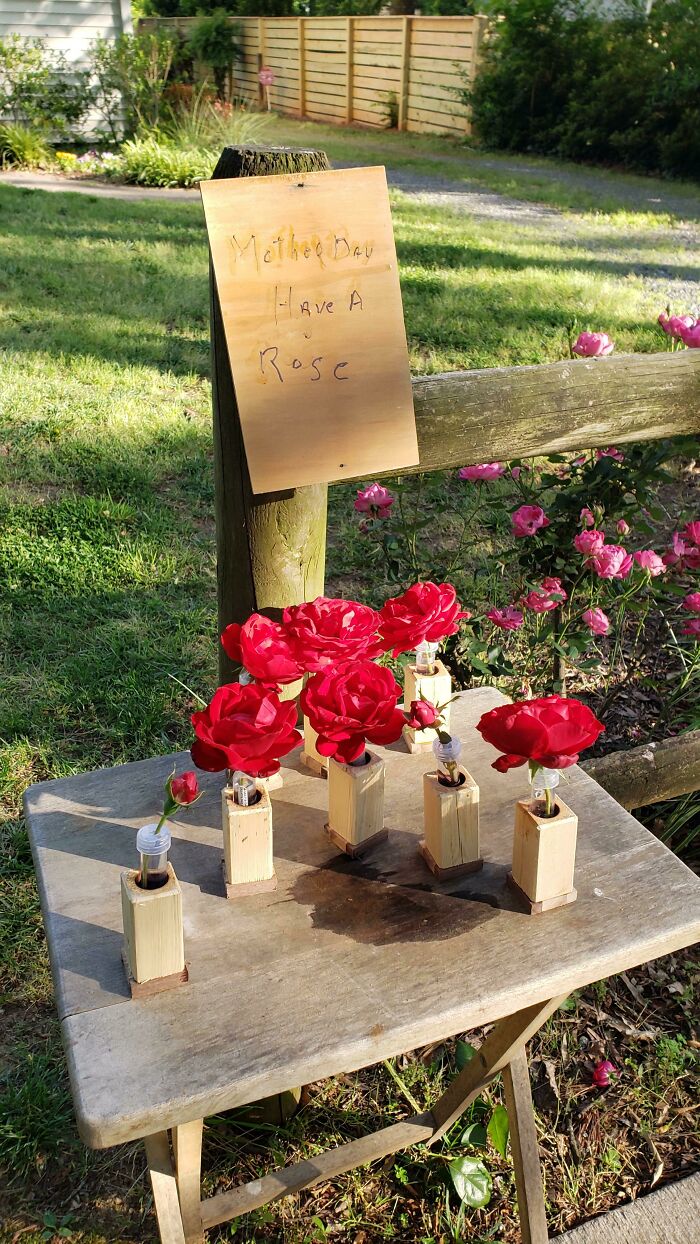 90-Year-Old Neighbor On Strict Quarantine Put Out A Table Of Roses From His Garden In Wood Vases He Made By Hand