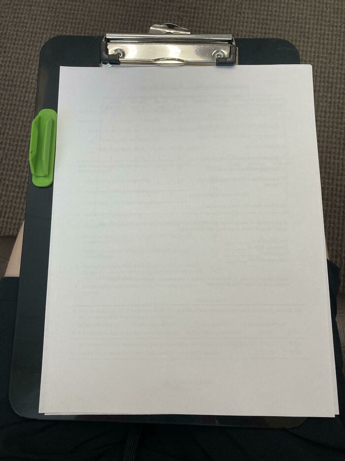 Oddly Placed Pencil Holder Prevents The Paper From Completely Fitting On The Clipboard
