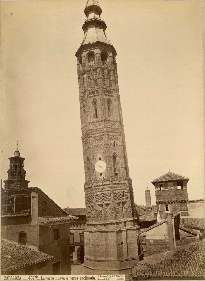 Leaning Tower Of Zaragoza, Spain (1504-1892). Demolition Justification: Ruinous State And Inclination. A Statue Of A Child Looking Up To Where It Stood Stands Near The Site Today