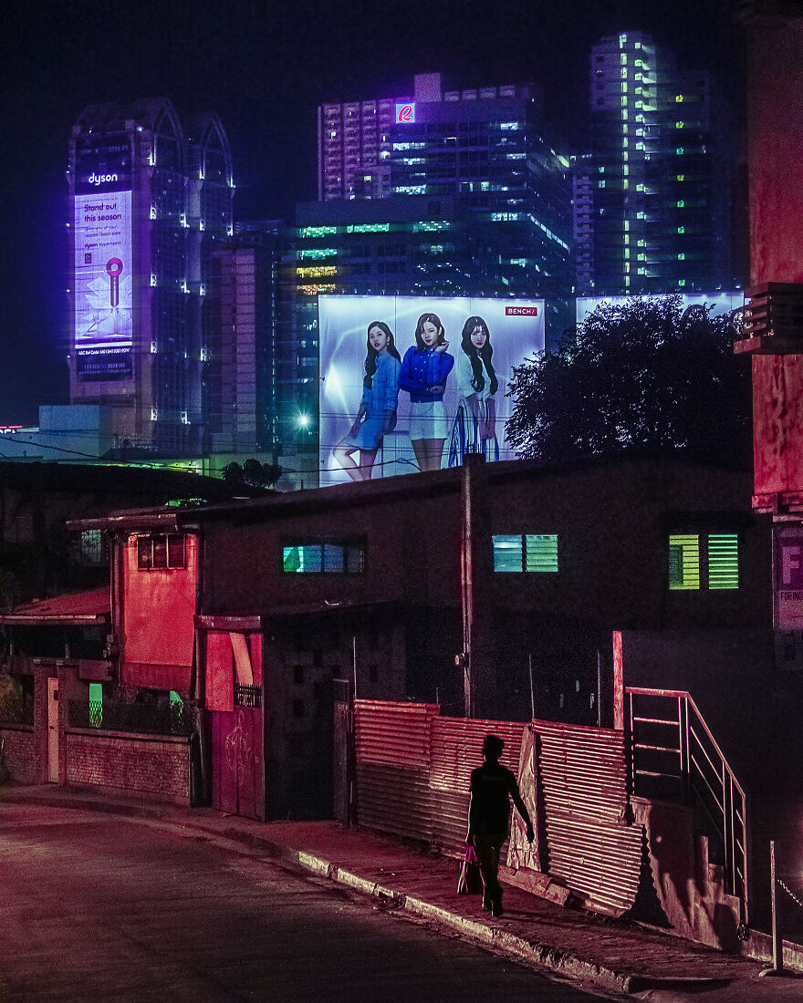 Cyberpunk Is Said To Be A Juxtaposition Of "High Tech" And "Low Life", Which Are The Themes I Try To Capture In Photography. This Was Taken At A Dark Unkempt Street In Guadalupe, Juxtaposed Against Bright Billboards And The High-Tech Megacorporate Development Known As "Cybergate City" In The Background