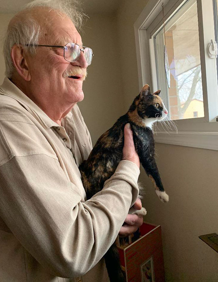 My Grumpy Dad When He Holds Up The Cat So She Can Look Out The Window