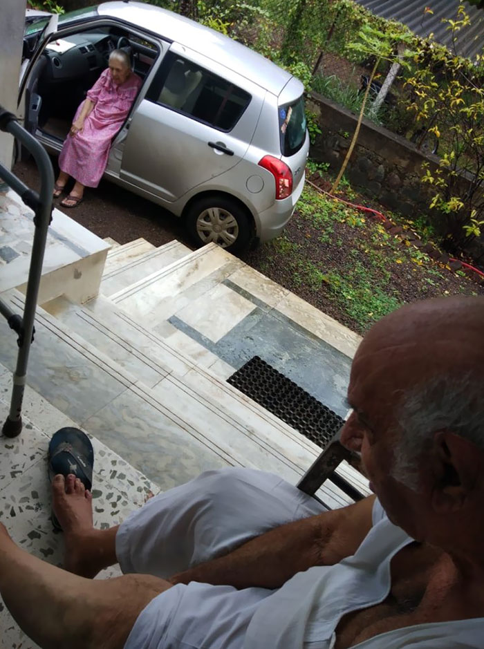 Sister Visits Brother A Lot, They Can't Use The Stairs So She Sits In Her Car And He Sits On The Balcony And They Chat