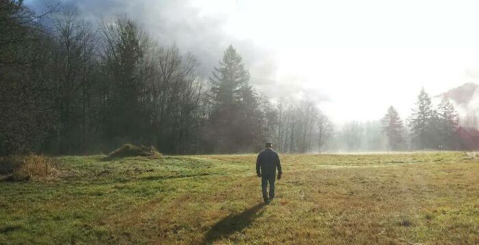 My Dad One Morning. My Daughter Took This A Few Years Ago Of My Dad Walking Across A Field On Their Property. My Dad Passed Away Last Fall And This Picture Will Always Be My Favorite One Of Him My Daughter Took This With No Filters Or Editing.