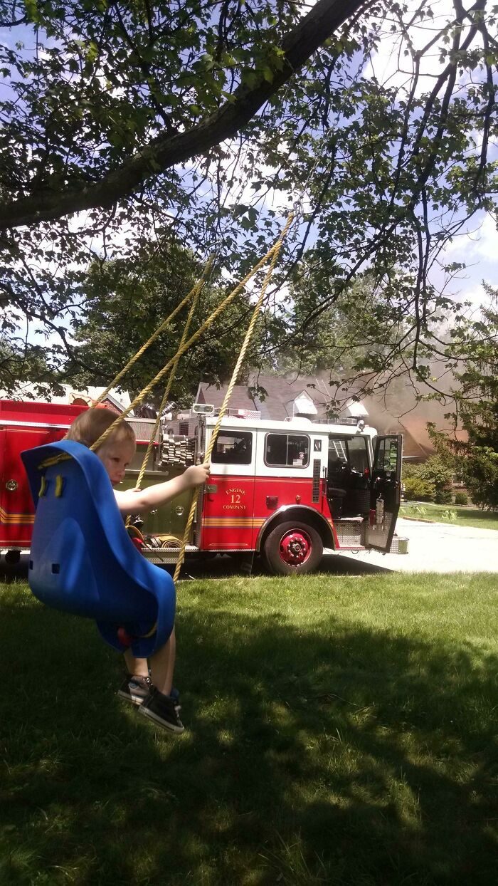 House Across The Street Is Burning. Fire Trucks, Police Cars, Flames...my Kid Gives Zero Fucks. She Wants To Swing.