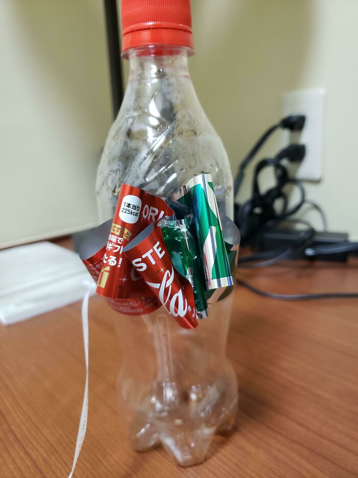 Over In Japan, You Can Tie The Sticker On A Coke Bottle In A Bow By Pulling A Tab