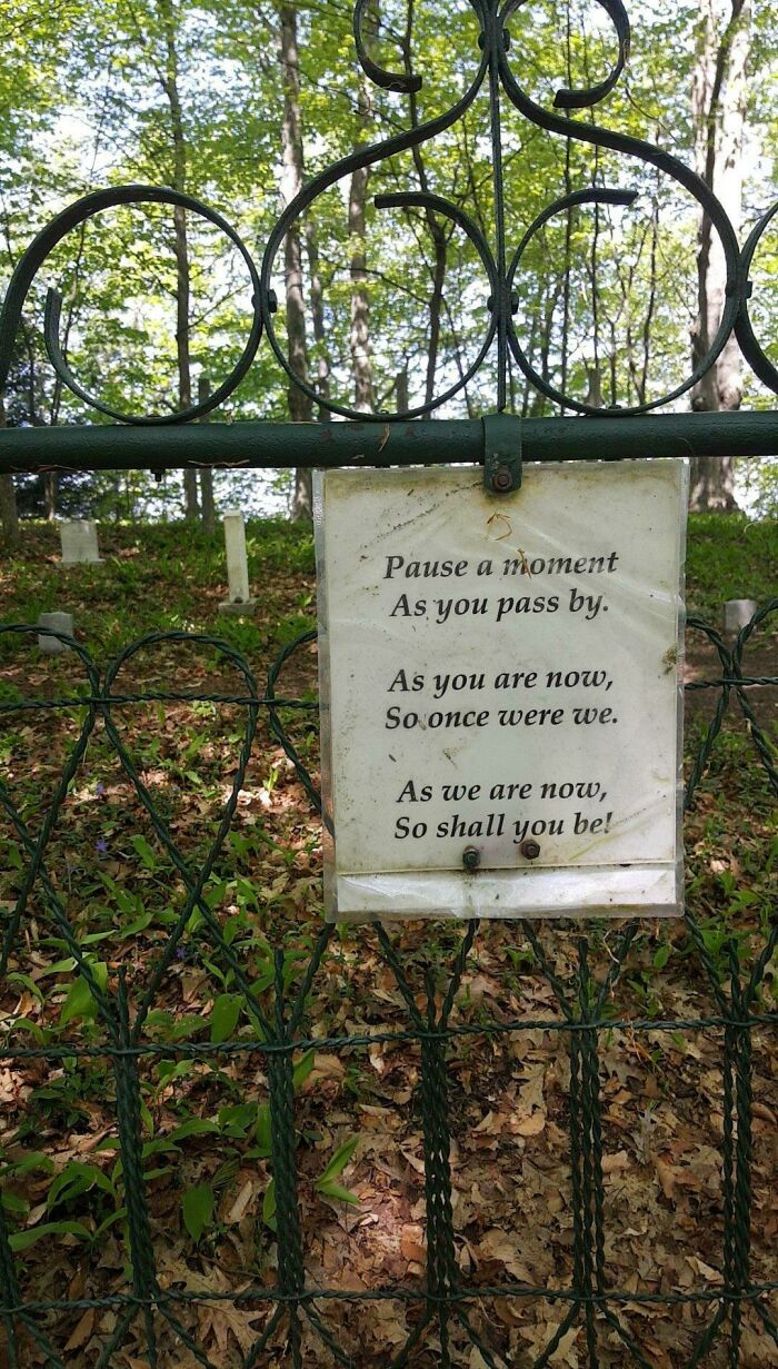 Very Humbling Sign Posted Outside A Cemetery In The Middle Of The Woods