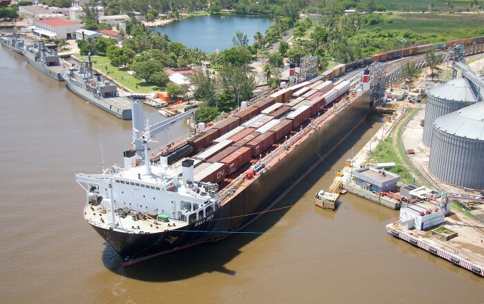 A Freight Train Being Loaded On A Ship In Coatzacoalcos, Mexico