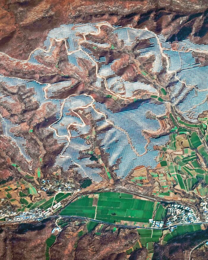 Solar Panels Covering The Hillside In China's Henan Province