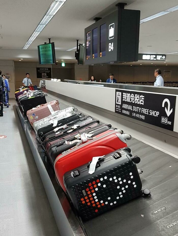 At Narita Airport In Tokyo They Neatly Line Up Your Suitcases With The Handle Facing Up