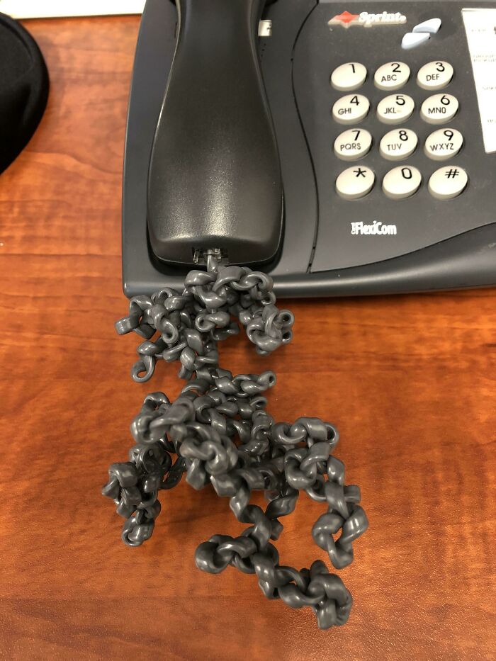 Has To Use My Coworkers Office Today Who Is On Vacation To Make Some Phone Calls. This Is What His Phone Cord Looks Like
