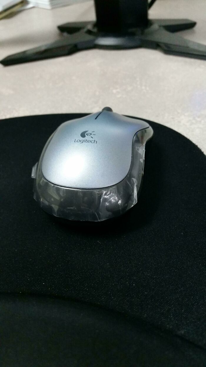 Co Worker Has Had This Mouse For Years. How Do People Just Leave The Plastic On