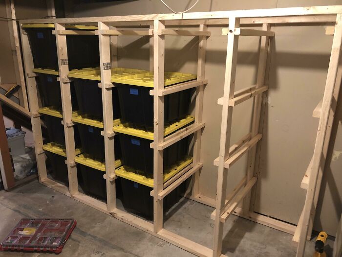 I Standardized All My Storage Bins But Got Tired Of Unstacking/Restacking Every Time I Needed Something From The Bottom Bin. I Built This Rack So Each Bin Can Slide Out, And It Wastes Very Little Storage Space. What Do You Think?