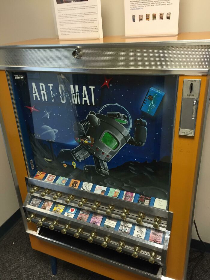This Old Cigarette Machine At The Local Library Has Been Repurposed To Dispense Artwork
