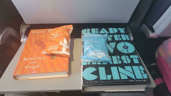 My Wife And I Had Plane Snacks That Matched Our Books On Our Way To Our Honeymoon