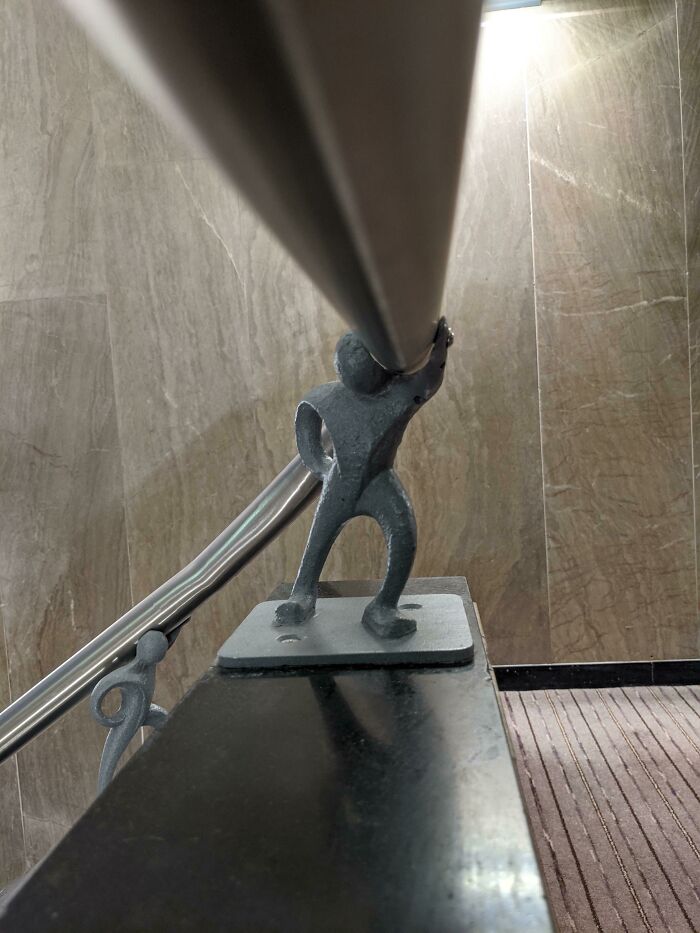 The Banisters At My Hotel Were Held Up By Little Metal Men
