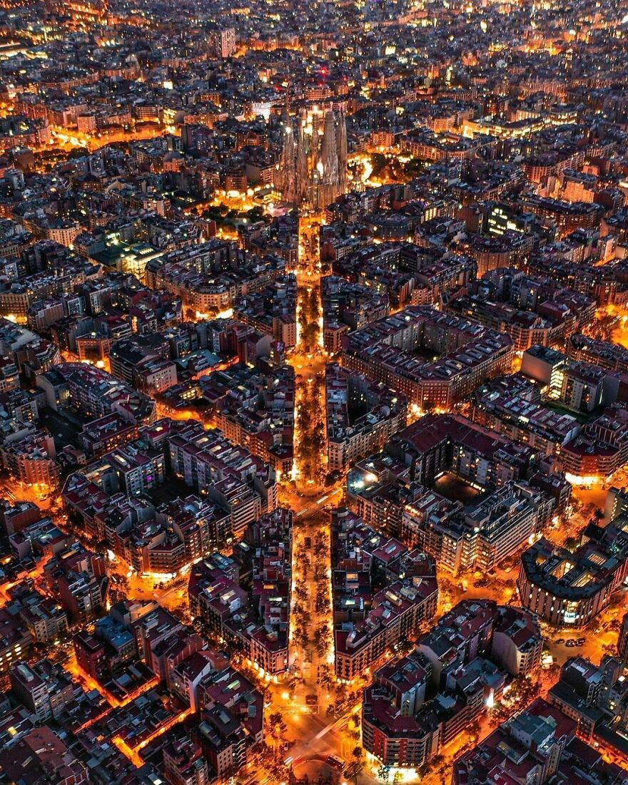 Glowing Barcelona With The Basílica De La Sagrada Família In The Middle, Spain