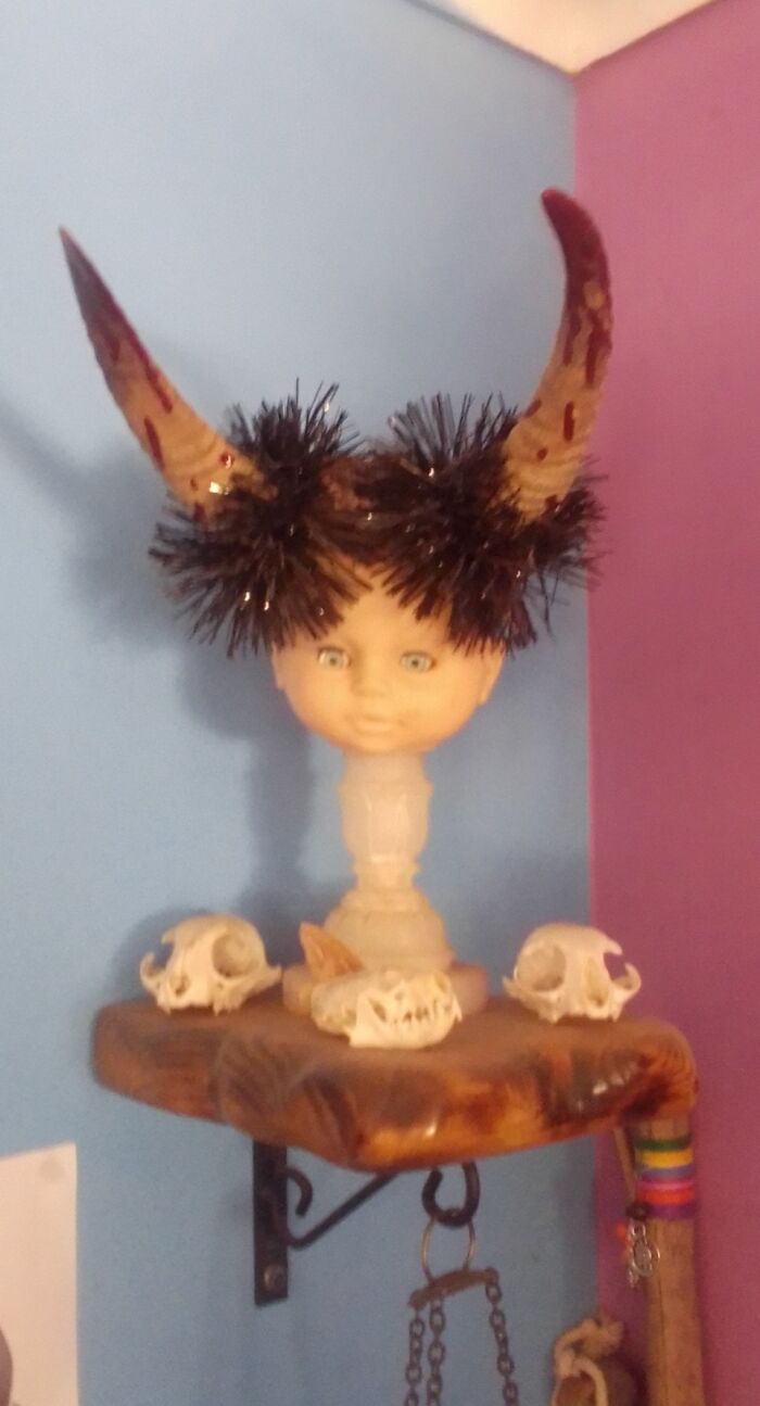 This Doll Head With Real Goat Horns And Real Cat Skulls. Its Our "Angel" We Put On Our Christmas Tree