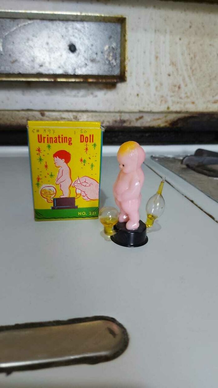 Urinating Doll: I Found This While Helping My Father Spring Cleaning. I Decided To Keep It. When You Touch The Glass Bubble At The Back, The One In The Front Starts Filling In