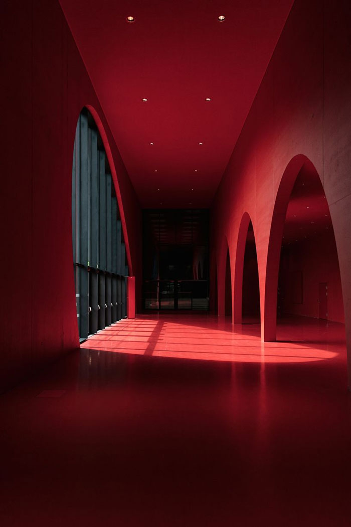 Marte Marte Architects Presents Dramatic Exhibition Hall In Red And Black