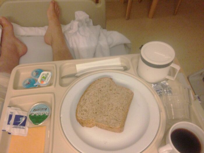 My Breakfast Today In The Hospital. Dry Bread, One Slice Of American Cheese, Bit Of Jam, Sugar And Milk For Instant Coffee. It's Not Prison, Just A Belgian Hospital