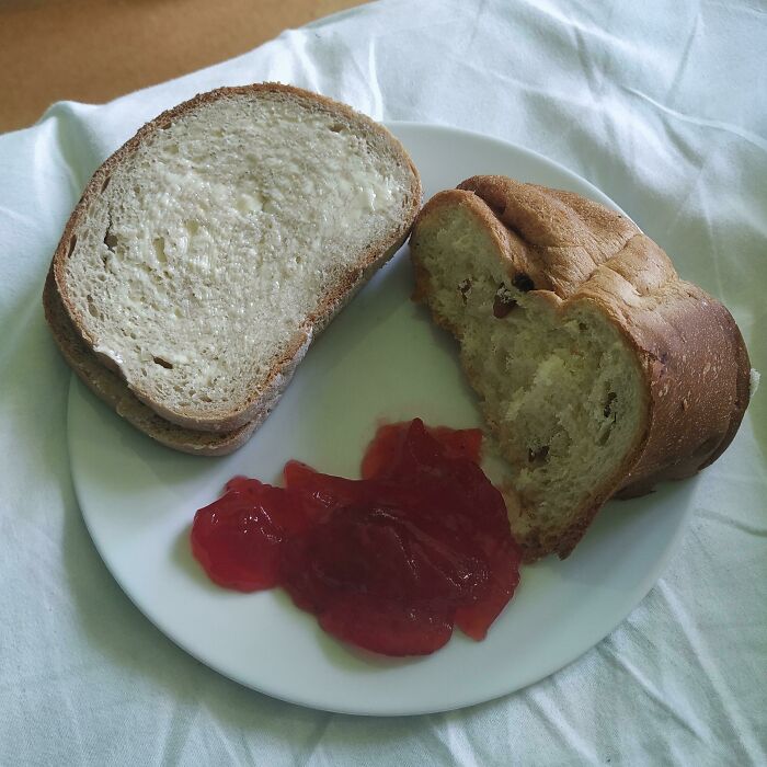 2 Buttered Slices Of Bread, Some Kind Of Sweet Bun And Strawberry Jam. Hospital Food Hours. Honestly The Bread Is The Best Part. Southern Poland