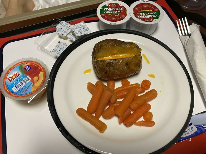 US Hospital Food: Gourmet Baked Potato, Fresh Steamed Baby Carrots, And Fresh Fruit Cup. And Cranberry Juice. And That’s The Description On The Menu