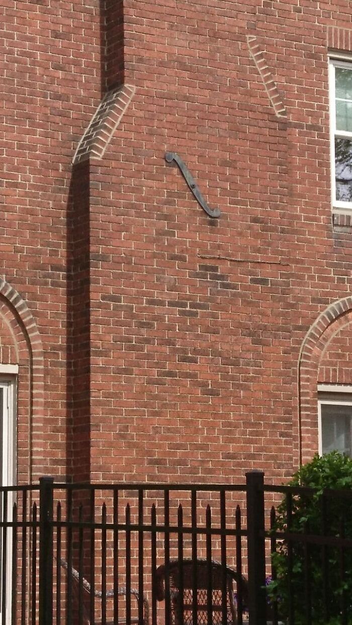 What Is This S-Shaped Metal Ornament On This House?