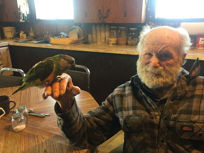 My 92 Year Old Grandpa Holding My Parrot For The First Time. He Insisted That I Take A Photo Of Him So He Could Print It Out To Show His Friends