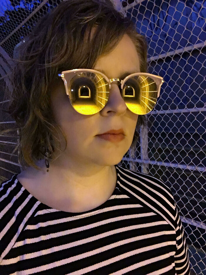 Reflection Of Tunnel In Mirrored Sunglasses