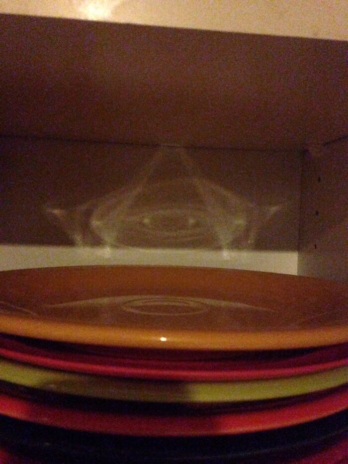 My Plates Create An Illuminati Sign When Reflected By Light