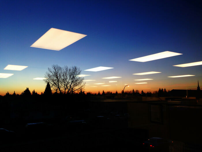 Took A Pic Of The Sunrise Out My Office Window And The Interior Lights Made Some Cool Reflections